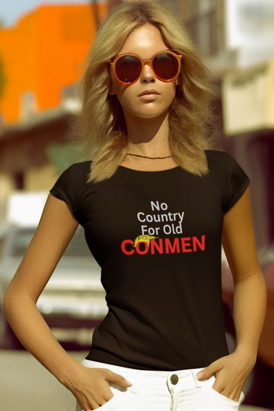 Person wearing a black t-shirt with text on a street.