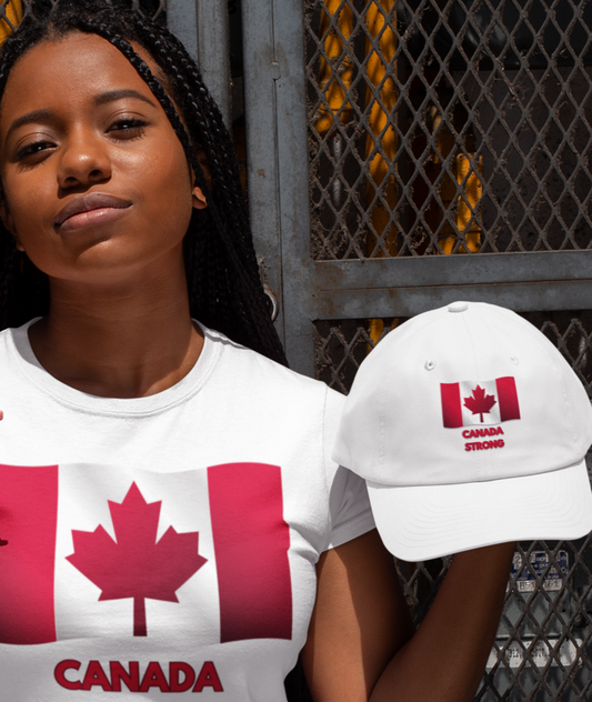 Person wearing a 'Canada Strong' t-shirt and cap with a Canadian flag design.