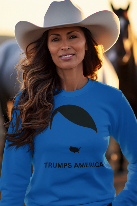 Woman wearing a blue sweatshirt with 'TRUMPS AMERICA' text and a cowboy hat, standing in front of horses.